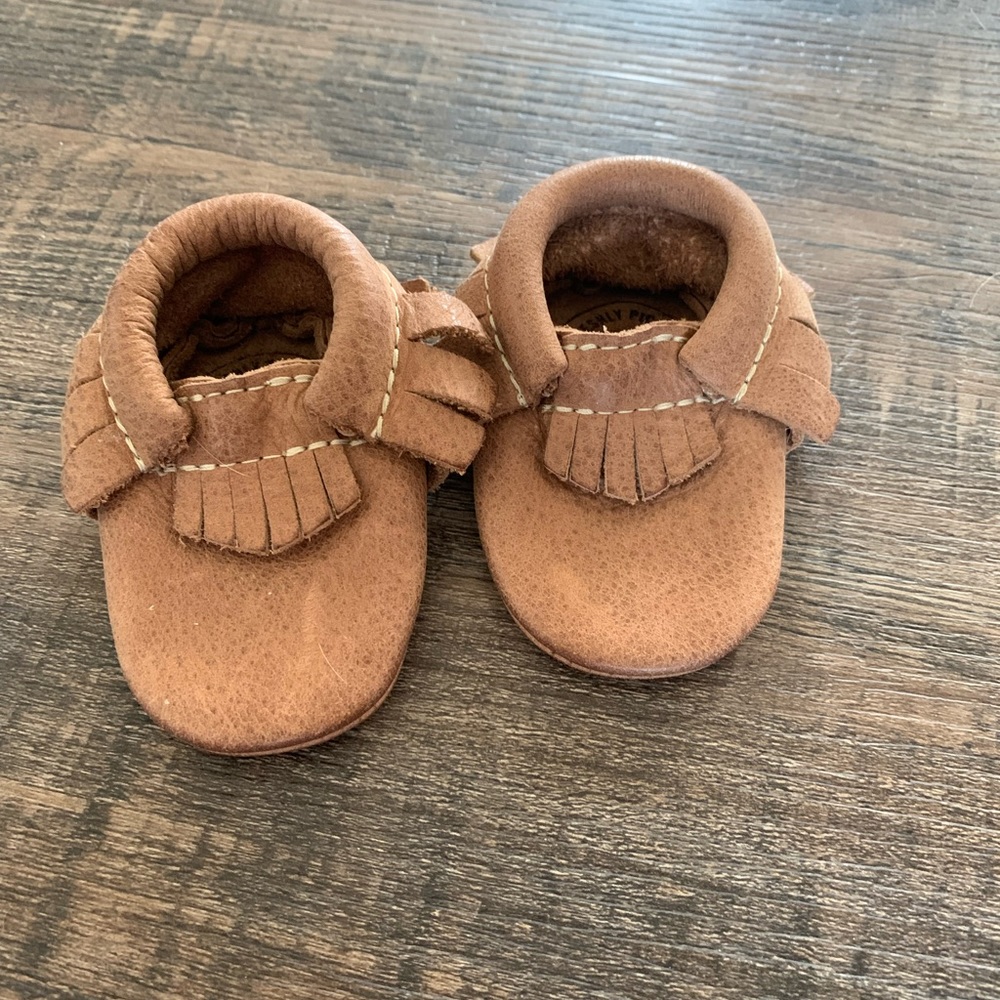Newborn Freshly picked moccasins. Weathered brown